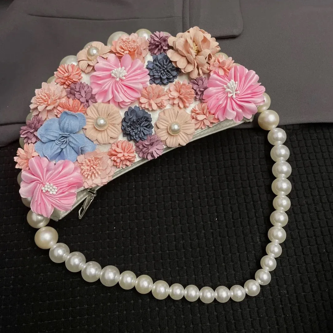 Silk clutch bag - pearl-embellished floral handbag