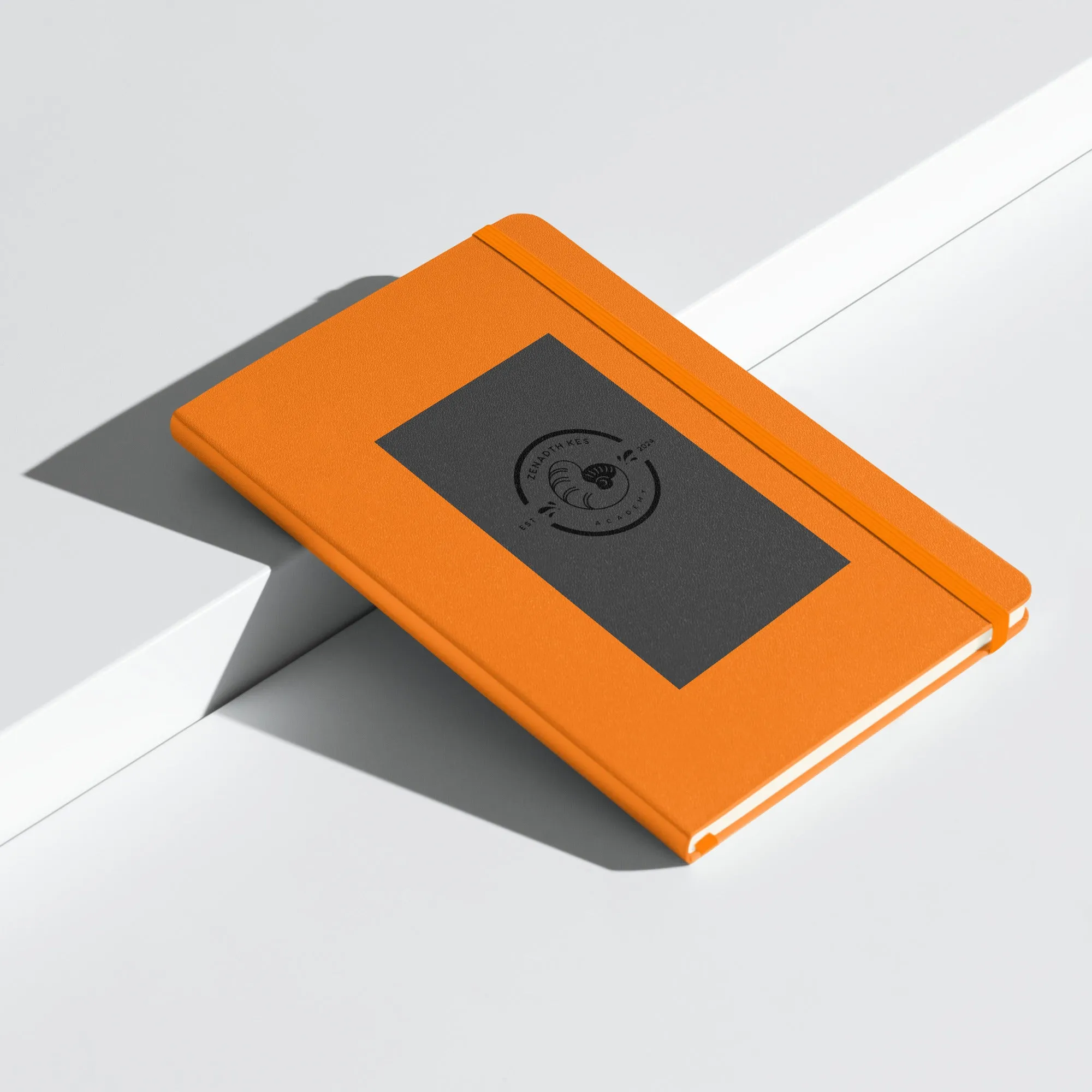 Zenadth Kes Academy logo on Hardcover bound notebook