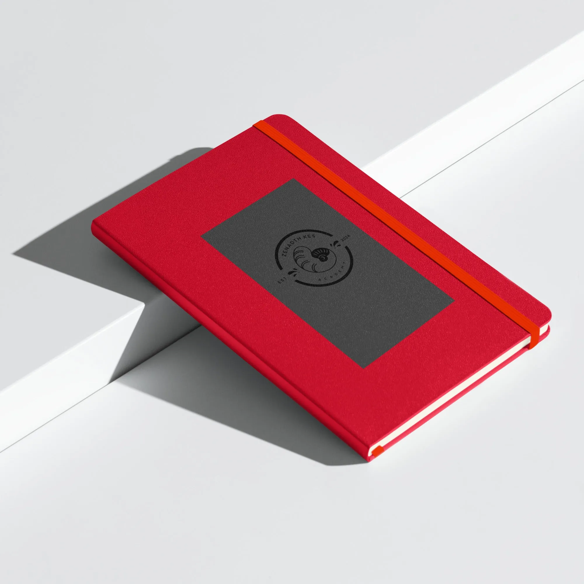 Zenadth Kes Academy logo on Hardcover bound notebook