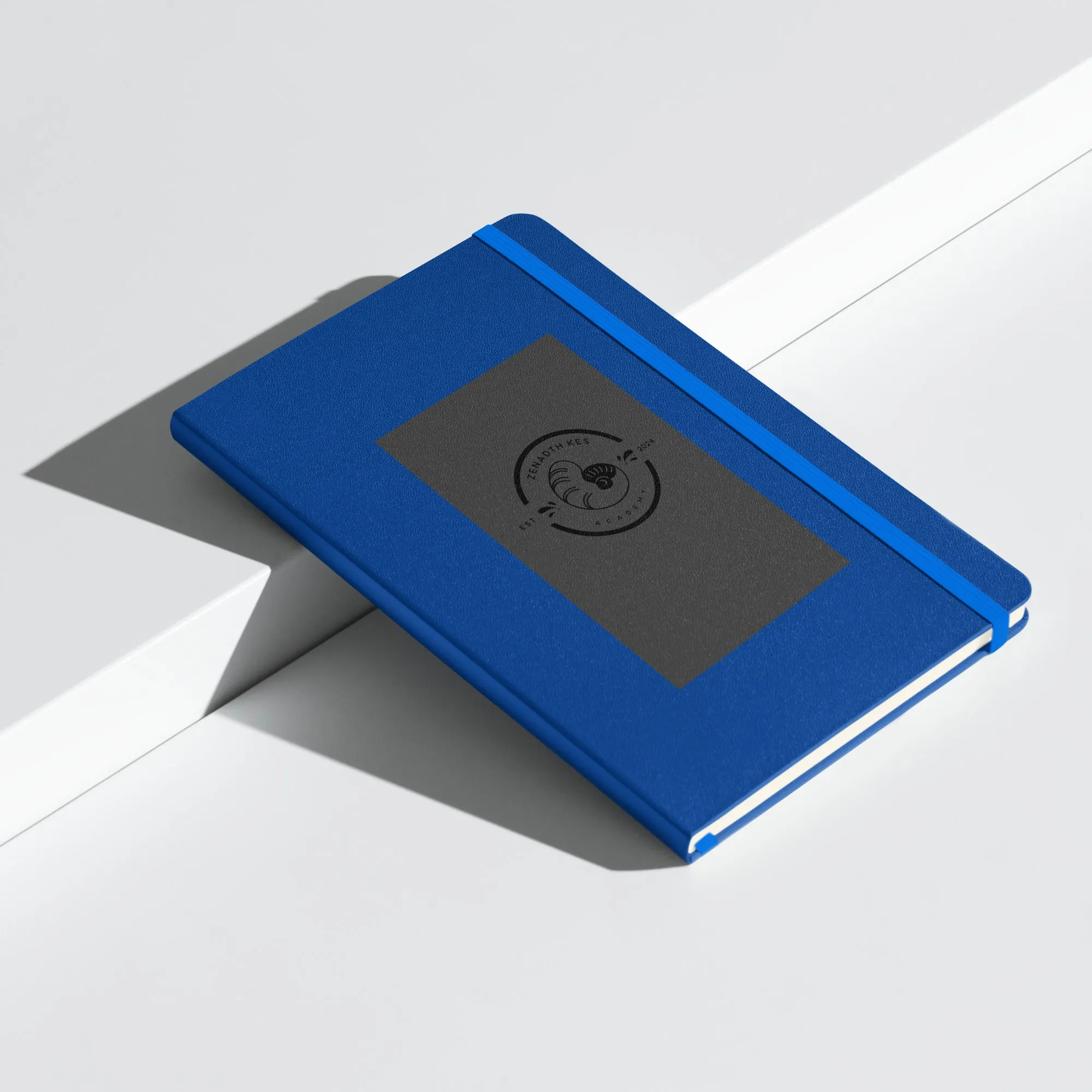 Zenadth Kes Academy logo on Hardcover bound notebook