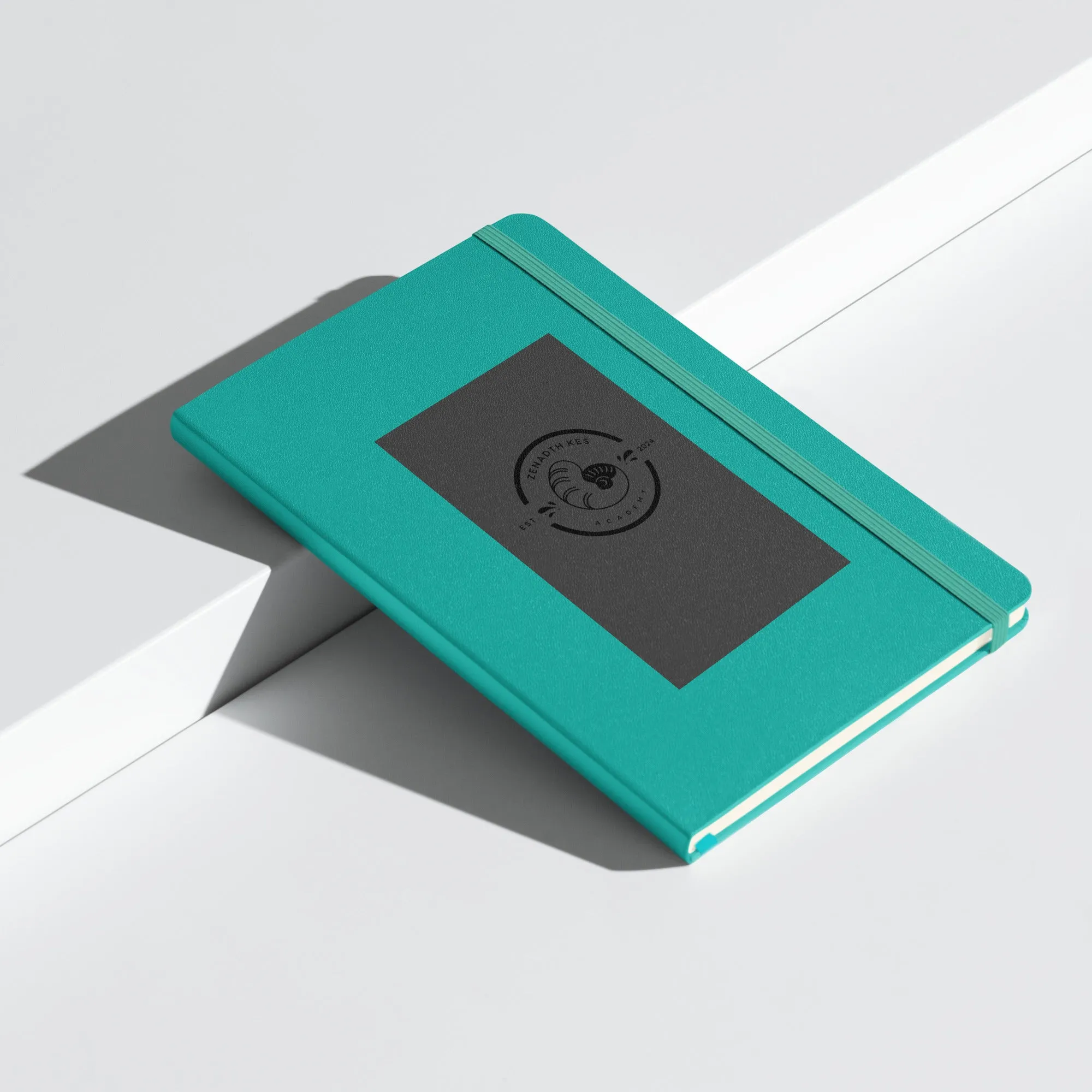 Zenadth Kes Academy logo on Hardcover bound notebook
