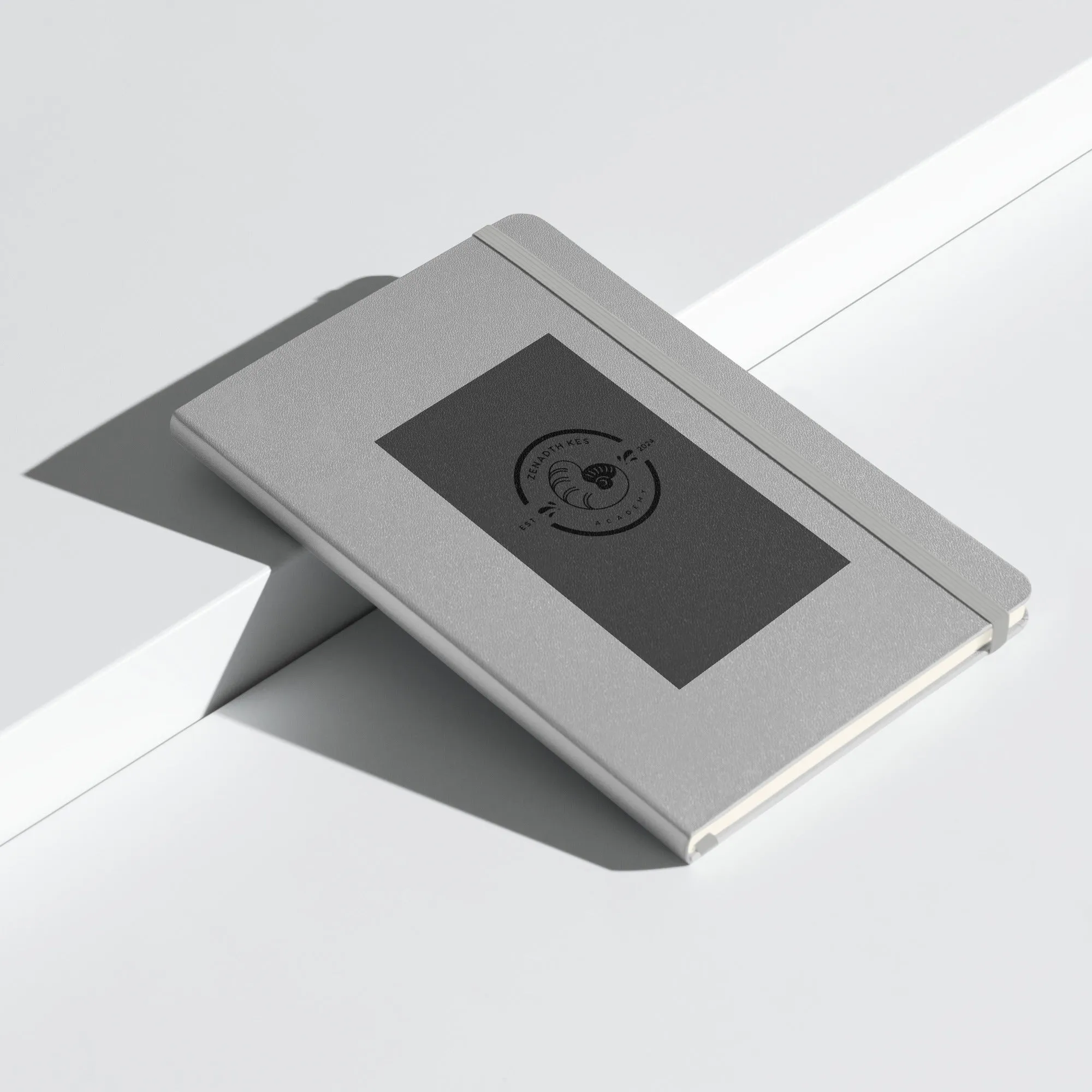 Zenadth Kes Academy logo on Hardcover bound notebook